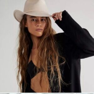 Beautiful hat! Very pale pink; almost cream